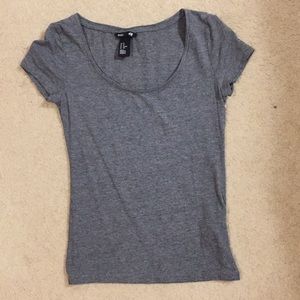 tight fitting gray t-shirt